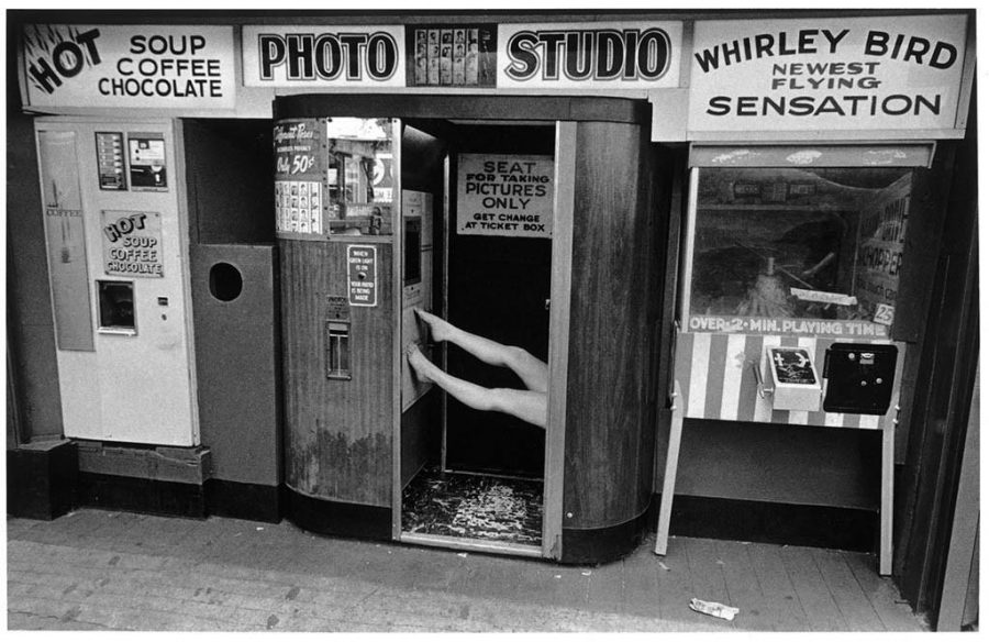 Legs in Photo Booth, Coney Island, 1974 - Photo by Harvey Stein