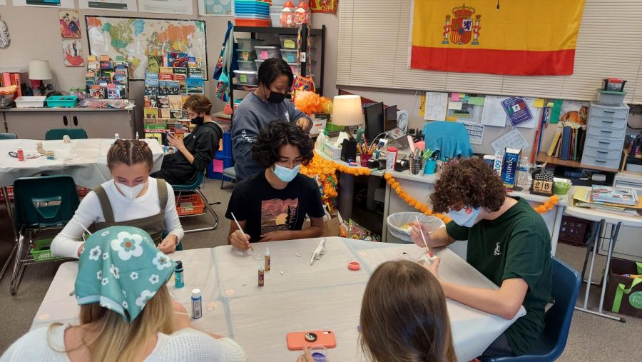 Eyes locked on his alebrije, Amogh Varanasi, 11, works alongside his classmates in their Day of the Dead celebration on Oct. 28. “We’re painting alebrijes for Day of the Dead,” Varanasi said. “It’s [a] celebration that happens mostly in Mexico [on] November 1st [and] 2nd.”